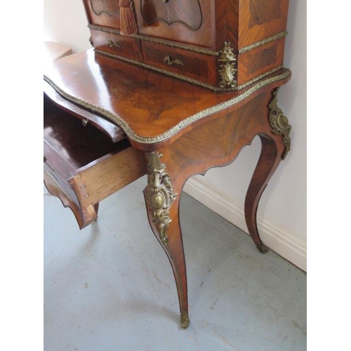 651 - A good 19th Century kingwood, rosewood and ormolu mounted Bonheur du Jour with cavetto top, enclosed... 