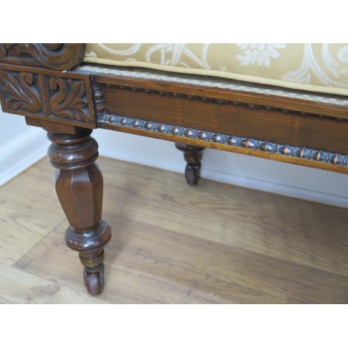 653 - A Regency carved mahogany scroll end recently reupholstered window seat on turned shaped octagonal l... 