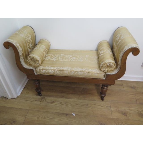 653 - A Regency carved mahogany scroll end recently reupholstered window seat on turned shaped octagonal l... 