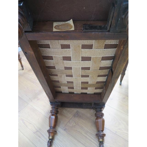 653 - A Regency carved mahogany scroll end recently reupholstered window seat on turned shaped octagonal l... 