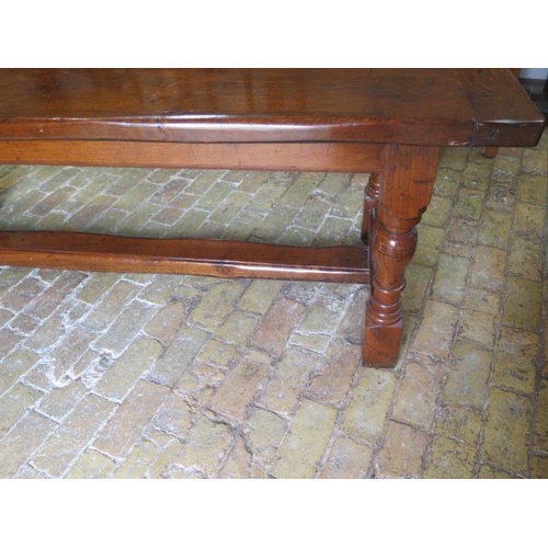 655 - An oak refectory table - Height 76cm x 198cm x 80cm - with good rich colour