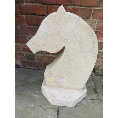 694 - A hand carved limestone garden sculpture based on a knight chess piece - carved in Cambridgeshire - ... 