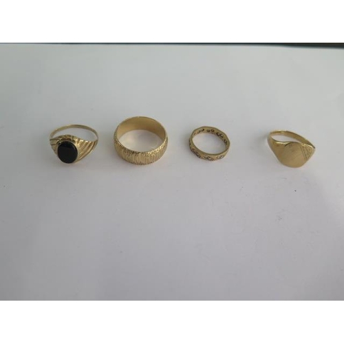 71 - Four 9ct yellow gold rings sizes J to U - total weight approx 12.4 grams