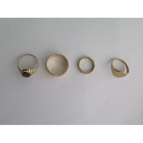 71 - Four 9ct yellow gold rings sizes J to U - total weight approx 12.4 grams