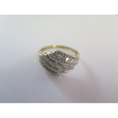 73 - A 9ct yellow gold diamond ring size S - approx weight 3.3 grams - generally good