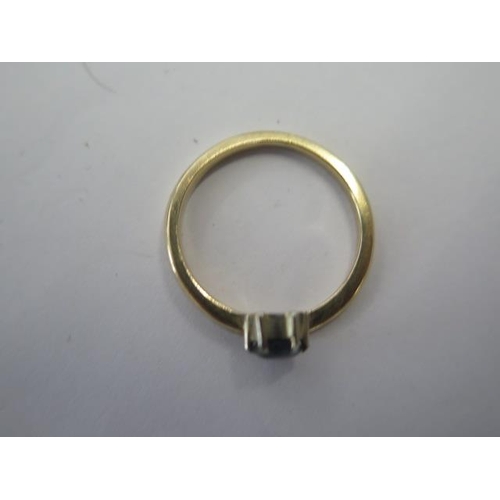 76 - A yellow gold sapphire ring size L - approx weight 2.4 grams - surface tests to approx 9ct - good co... 