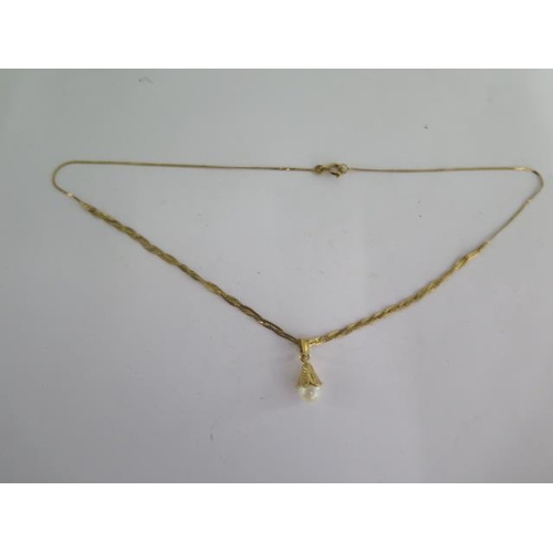 8 - An 18ct yellow gold pearl pendant on a 42cm 18ct chain - approx weight 6 grams - generally good