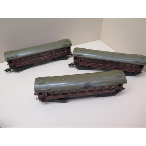 488 - Three early tinplate Marklin OO gauge coaches, two 0-4-4 locos (make unknown) and nine wood and meta... 