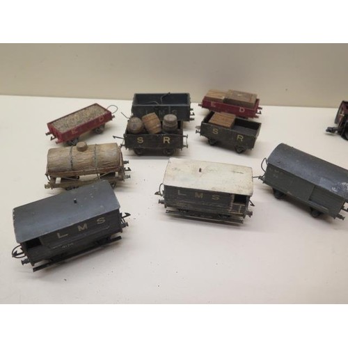 488 - Three early tinplate Marklin OO gauge coaches, two 0-4-4 locos (make unknown) and nine wood and meta... 