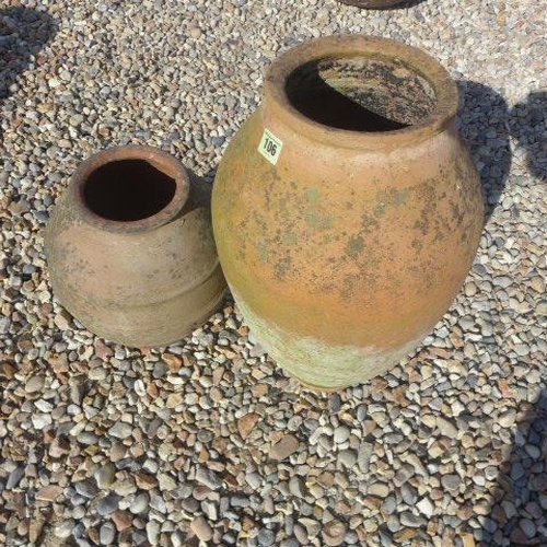106 - Two Cretan terracotta garden pots, tallest 48cm