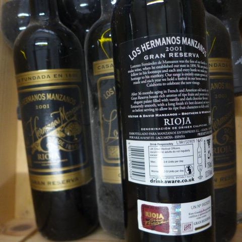 14 - Eight bottles of Los Hermanos Manzanos Gran Reserva 2001 Rioja red wine