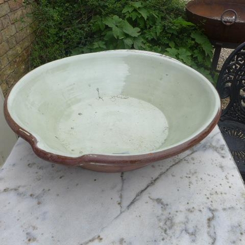 84 - A terracotta glazed bowl - Height 14cm x 54cm