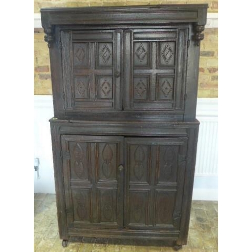 89 - An 18th century carved oak court cupboard with four doors - Height 178cm x Width 103cm