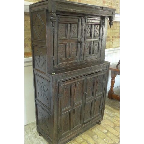 89 - An 18th century carved oak court cupboard with four doors - Height 178cm x Width 103cm