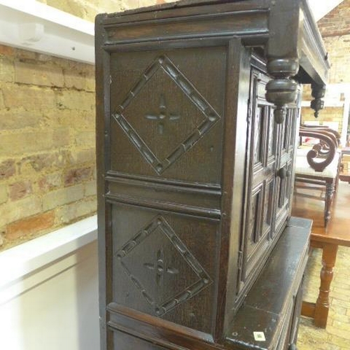 89 - An 18th century carved oak court cupboard with four doors - Height 178cm x Width 103cm