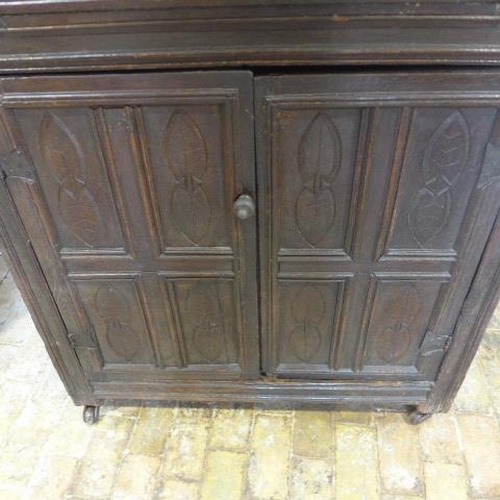 89 - An 18th century carved oak court cupboard with four doors - Height 178cm x Width 103cm