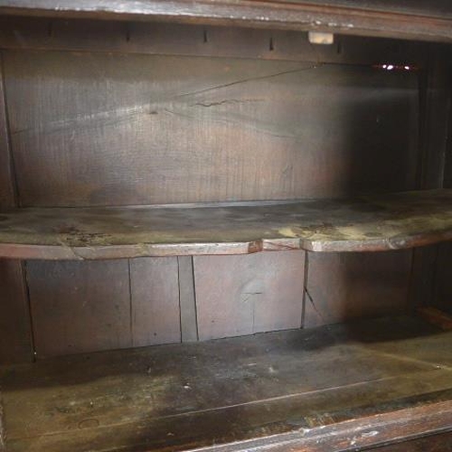 89 - An 18th century carved oak court cupboard with four doors - Height 178cm x Width 103cm