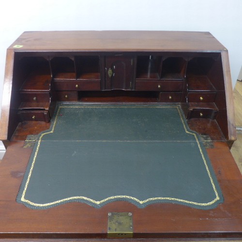 90 - A Georgian mahogany bureau with a well fitted interior over four drawers - Width 84cm x Height 96cm