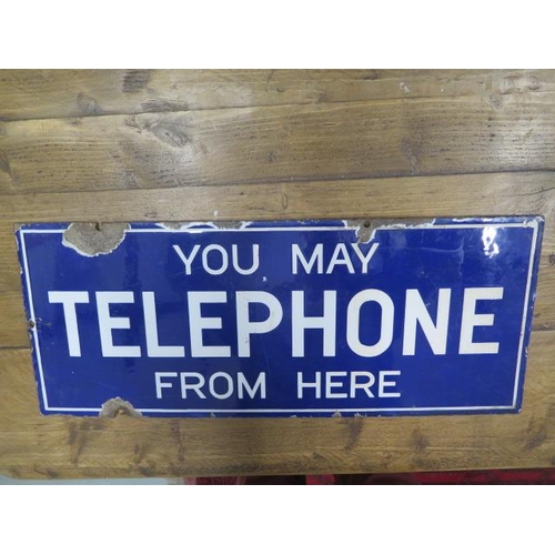  An enamel double sided 'You May Telephone From Here' enamel sign, 23cm x 56cm, some wear and chippin... 