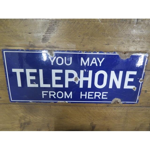  An enamel double sided 'You May Telephone From Here' enamel sign, 23cm x 56cm, some wear and chippin... 