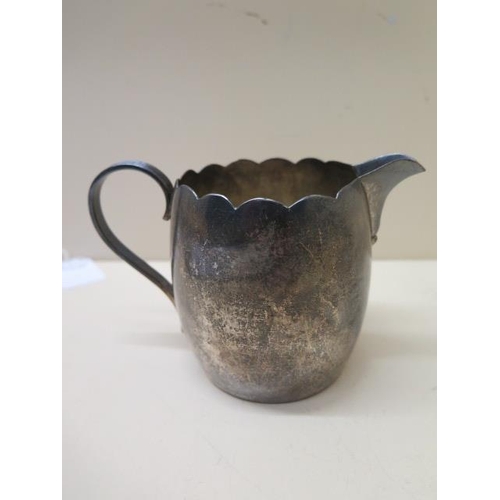 218 - A silver jug - London 1934/35 RWB - Height 9cm - approx weight 7.5 troy oz - small dent to base othe... 