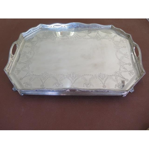 223 - A large silver octagonal galleried twin handle tray with garland and ribbon engraving London 1899/90... 