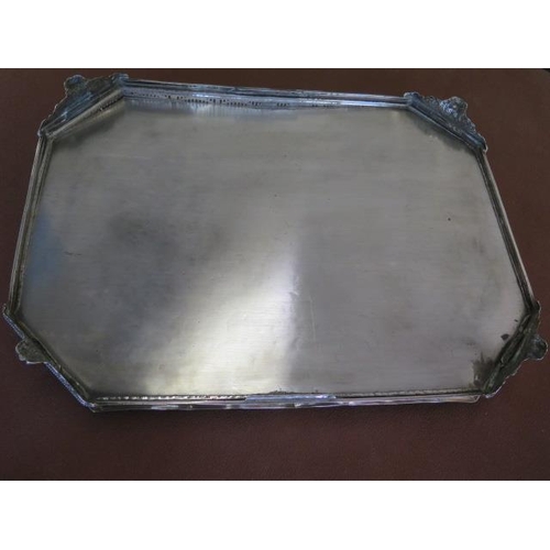 223 - A large silver octagonal galleried twin handle tray with garland and ribbon engraving London 1899/90... 