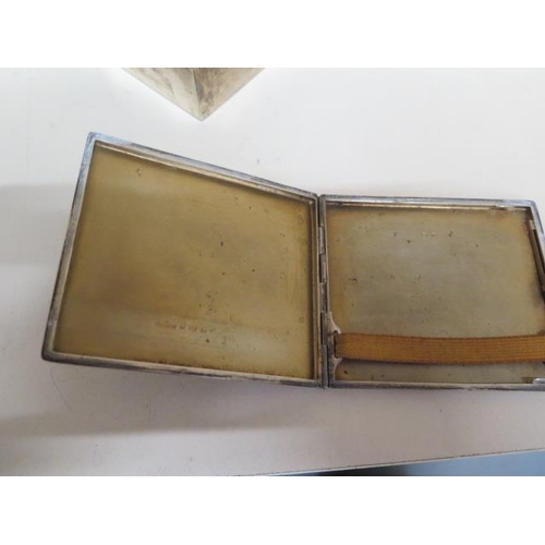 225 - A silver desk box - Width 9cm - two easel back frames - one split - a silver card/cigarette case app... 