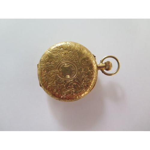 256 - An 18ct yellow gold half Hunter pocket watch with 35mm case, gold dust cover, approx 32 grams, good ... 