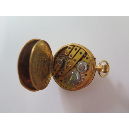 256 - An 18ct yellow gold half Hunter pocket watch with 35mm case, gold dust cover, approx 32 grams, good ... 