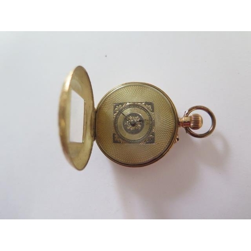 258 - A 14ct yellow gold pocket watch, 32mm wide case, approx 30 grams, wear to enamel and dial but runnin... 