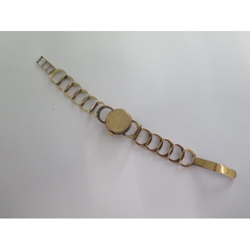 266 - A 9ct gold ladies wristwatch, not currently running, water damaged, weight approx 15.6 grams