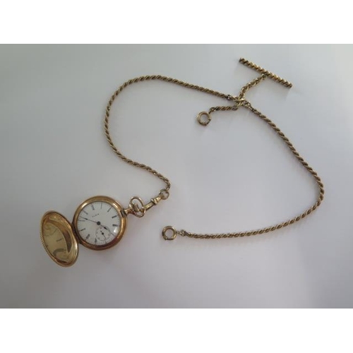 267 - An Elgin gold plated Hunter pocket watch on a 41cm gold plated double Albert chain, 35mm wide case, ... 