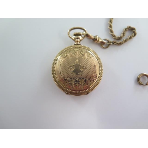 267 - An Elgin gold plated Hunter pocket watch on a 41cm gold plated double Albert chain, 35mm wide case, ... 