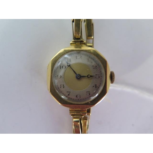 273 - An 18ct yellow gold manual wind ladies wristwatch on 18ct sprung strap - running - approx weight 17.... 