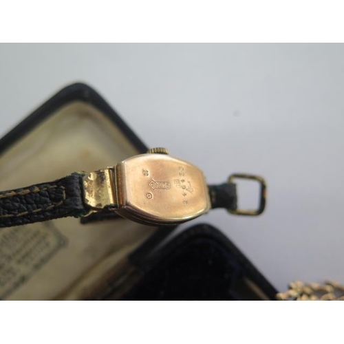 275 - A 9ct yellow gold bracelet watch (not running) approx 12.8 grams and a 9ct watch on a leather strap ... 