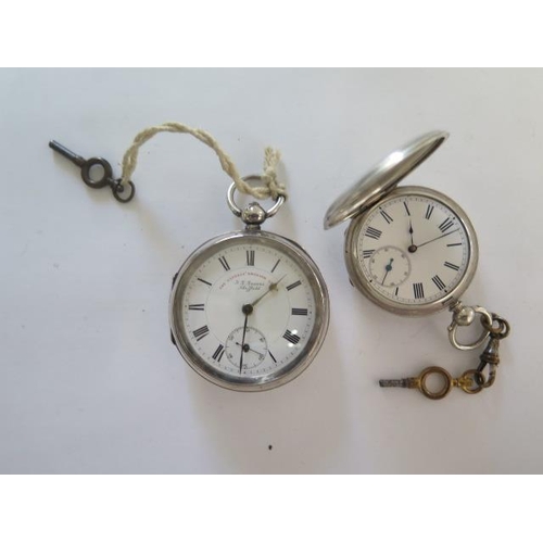 279 - A silver hunter pocket watch and an Express English lever silver pocket watch - both running