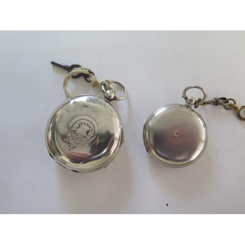 279 - A silver hunter pocket watch and an Express English lever silver pocket watch - both running