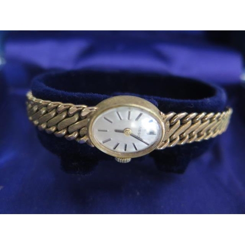 285 - A 9ct yellow gold Tissot bracelet manual wind ladies watch - 15mm case - approx weight 22 grams - wi... 