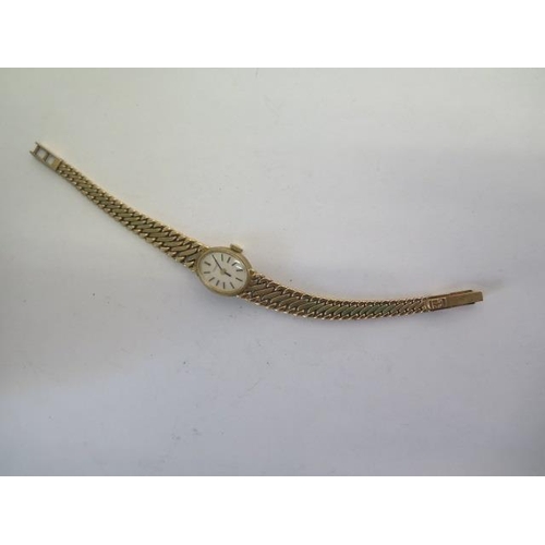 285 - A 9ct yellow gold Tissot bracelet manual wind ladies watch - 15mm case - approx weight 22 grams - wi... 