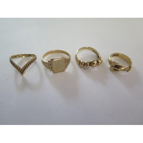 70 - Four 9ct yellow gold rings, sizes H, K, L, T, total approx 10.4 grams