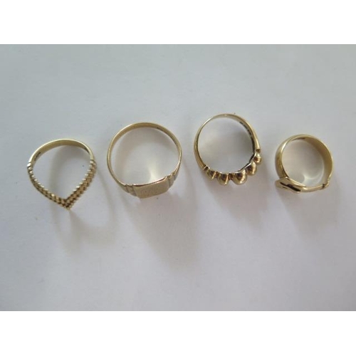 70 - Four 9ct yellow gold rings, sizes H, K, L, T, total approx 10.4 grams