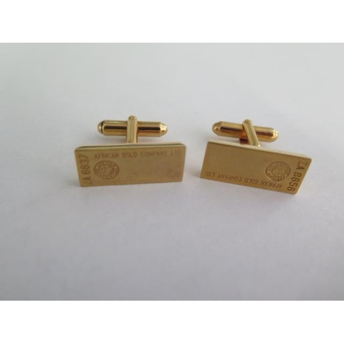 72 - A pair of African Gold Company Ltd gold plated ingot cufflinks, 2cm long, numbered ZA8656 and ZA6637