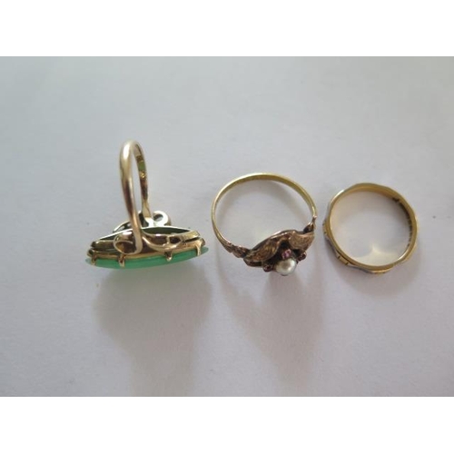 75 - A 14ct yellow gold jade ring, size K, approx 4 grams, a 22ct ring, size J approx 2 grams and a gilt ... 