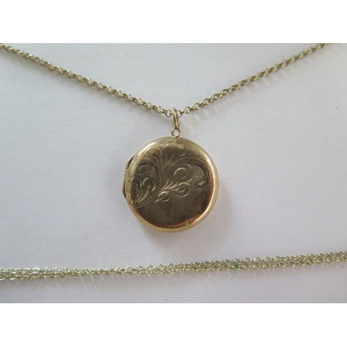 89 - Two 9ct yellow gold chains with pendant and locket and a 9ct chain, total approx 9.4 grams