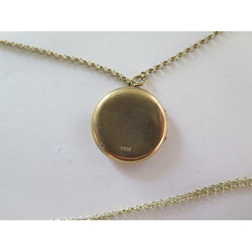 89 - Two 9ct yellow gold chains with pendant and locket and a 9ct chain, total approx 9.4 grams