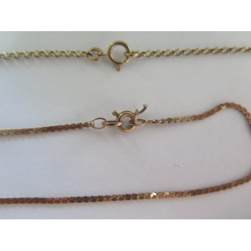 89 - Two 9ct yellow gold chains with pendant and locket and a 9ct chain, total approx 9.4 grams