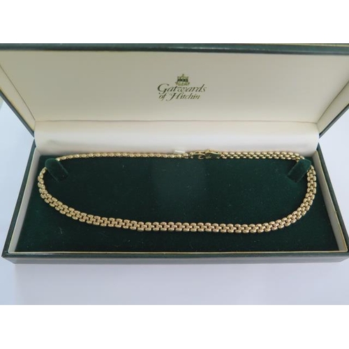 96 - A 9ct yellow gold 43cm long necklace - approx weight 13.9 grams - in good condition