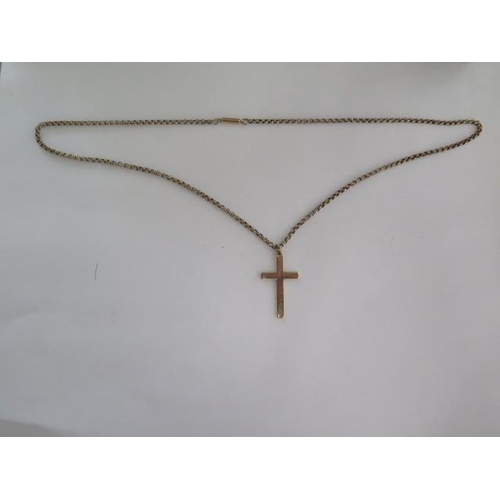 97 - A 9ct gold crucifix on a 9ct 52cm chain - good condition - approx weight 9.4 grams