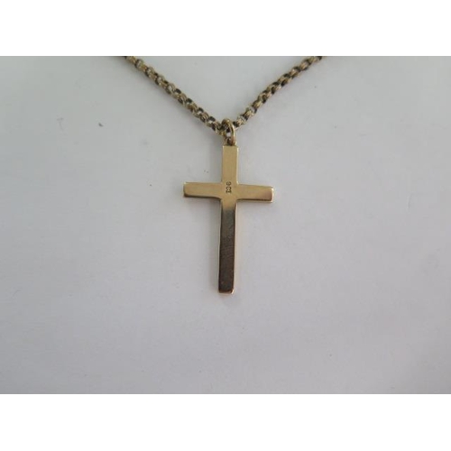 97 - A 9ct gold crucifix on a 9ct 52cm chain - good condition - approx weight 9.4 grams